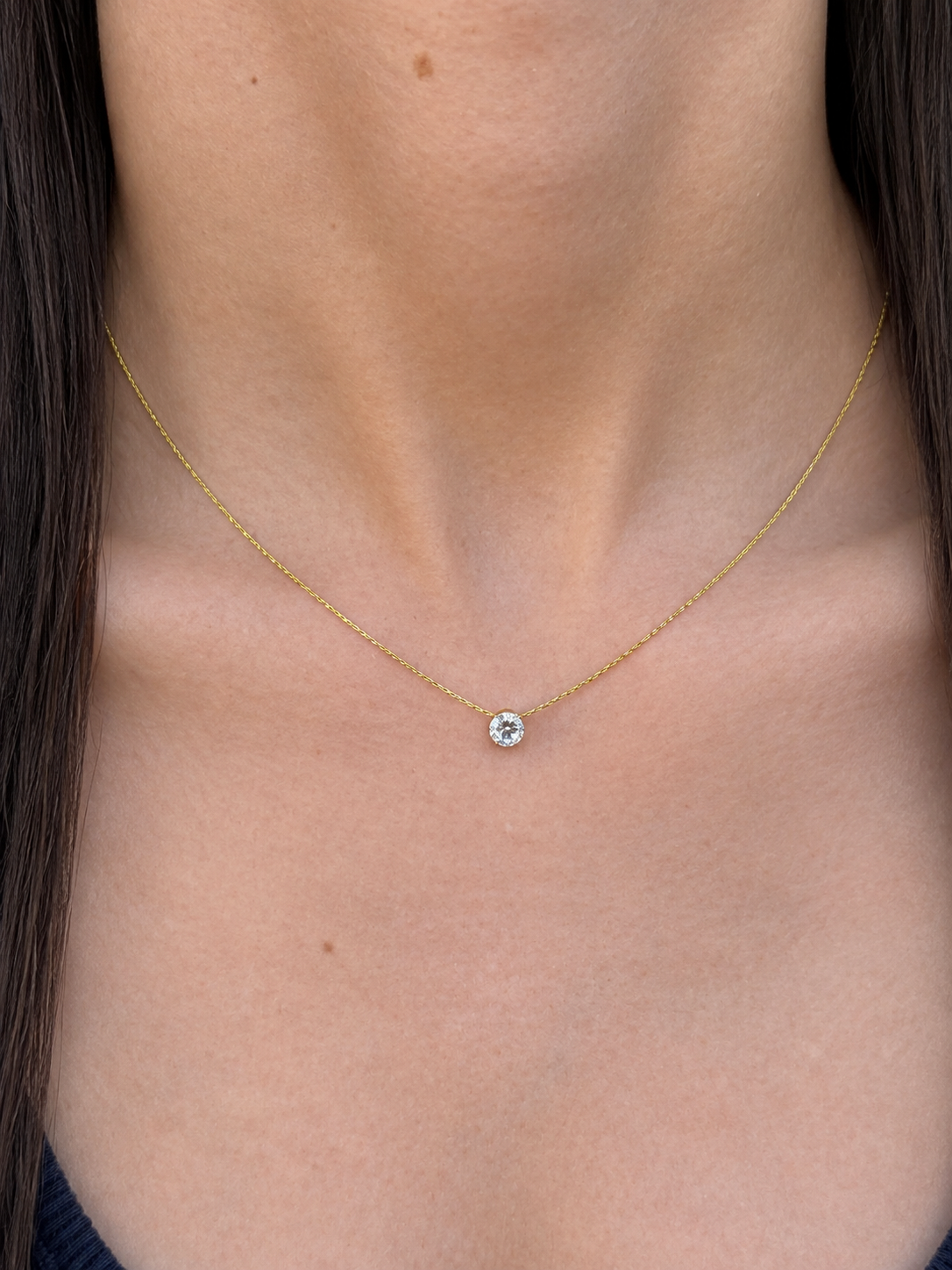 Collier doré pendentif brillant