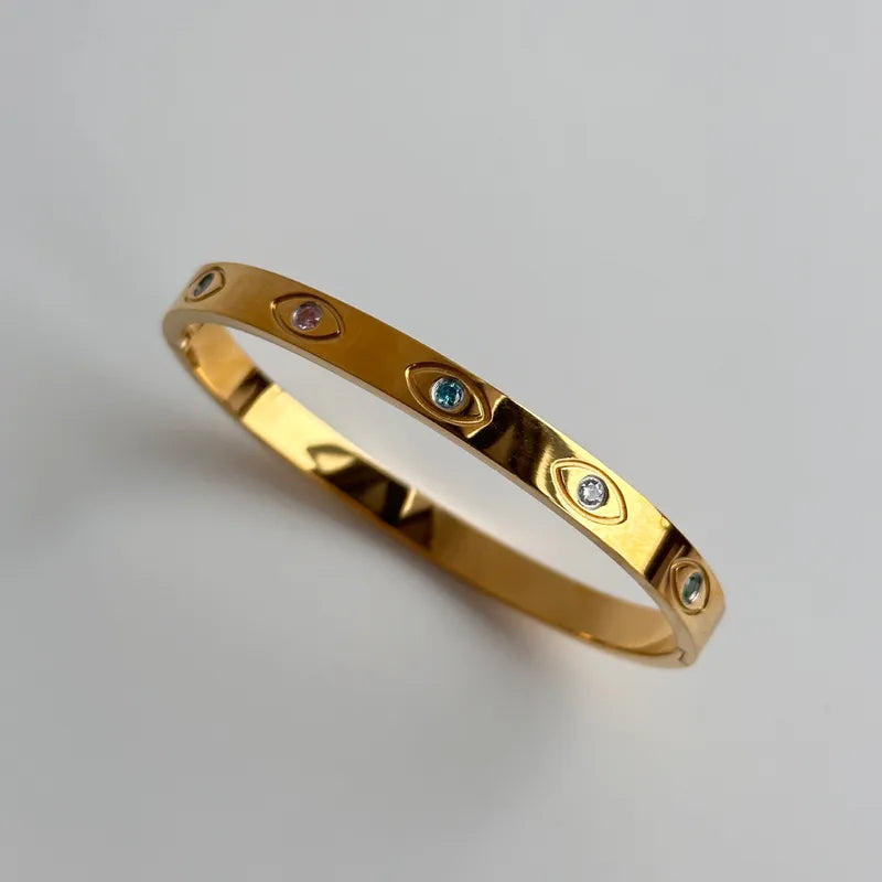 Bracelet doré œil brillant