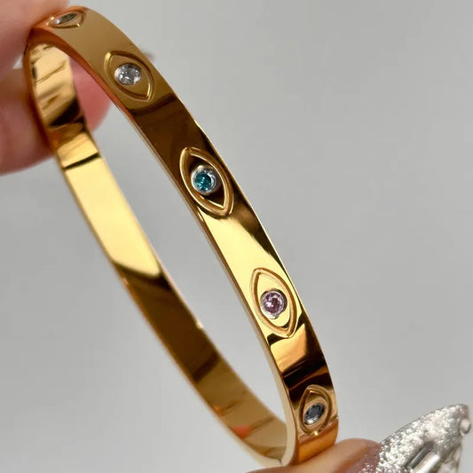 Bracelet doré œil brillant