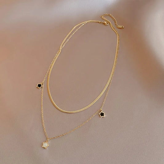 Collier doré pendentifs étoile