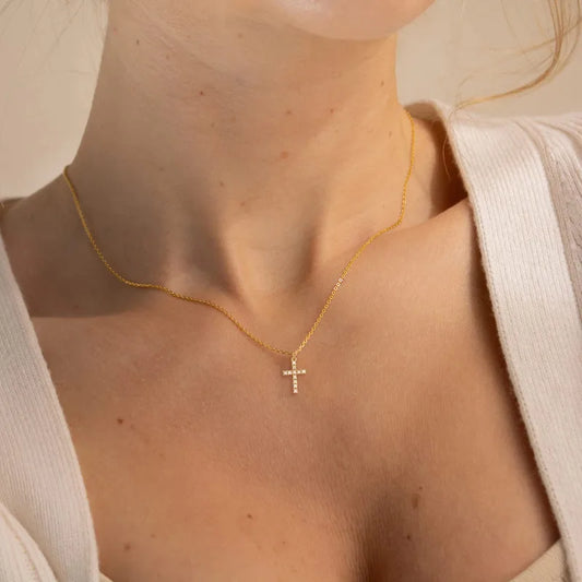 Collier doré pendentif croix
