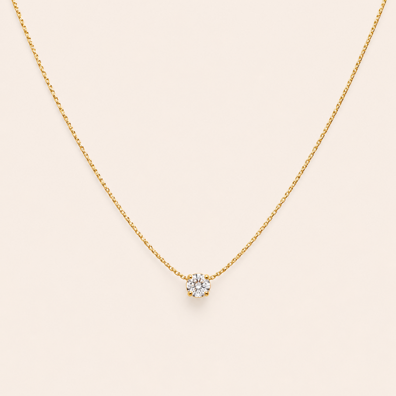 Collier doré pendentif brillant