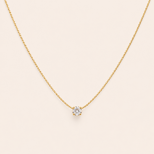 Collier doré pendentif brillant