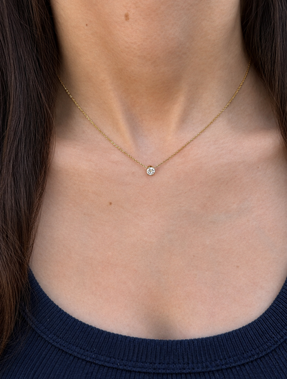 Collier doré pendentif brillant